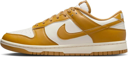 A Nike Dunk sneaker in a warm mustard yellow 