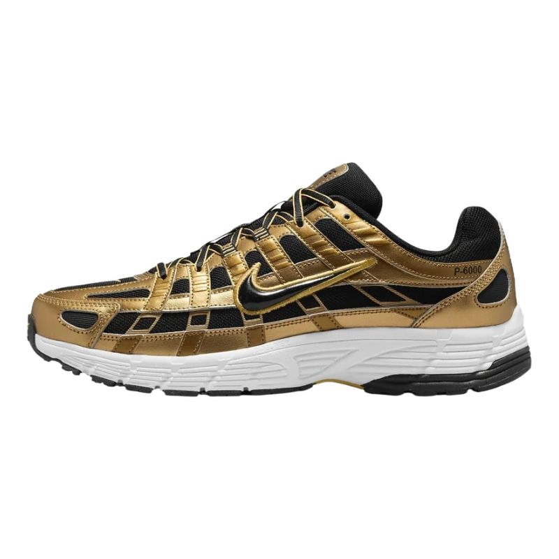A Nike Pegasus sneaker in metallic gold