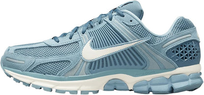A Nike running shoe in light blue.