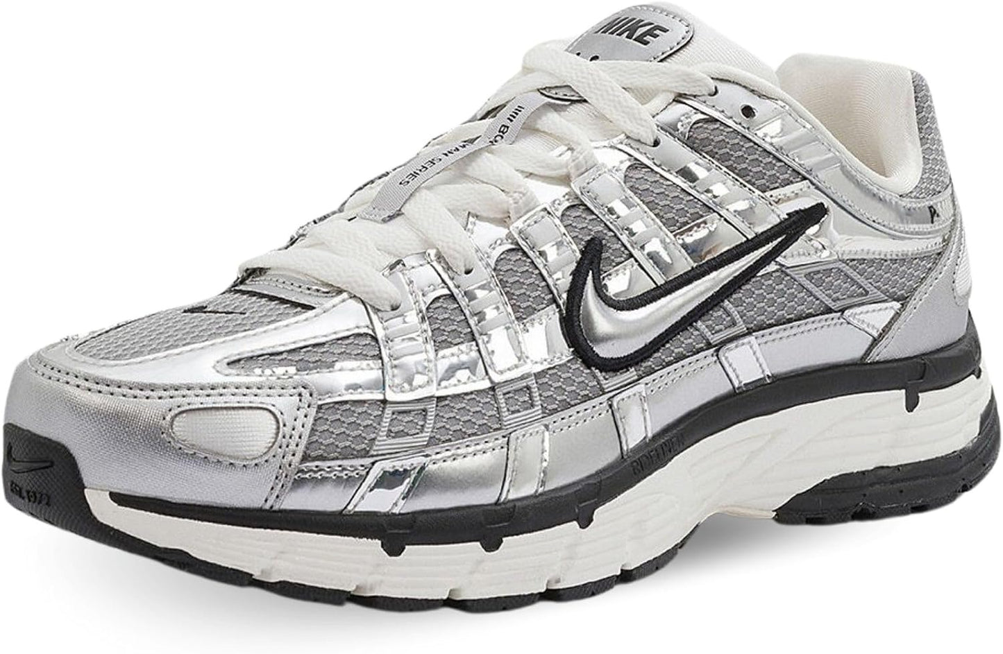 A Nike running shoe in metallic silver and white.