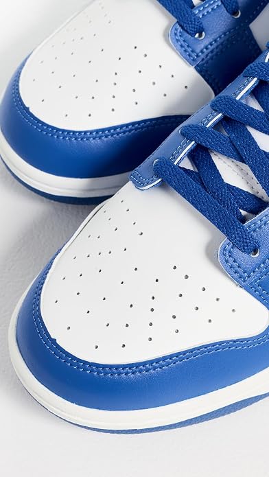 A close-up of a pair of low-top sneakers 