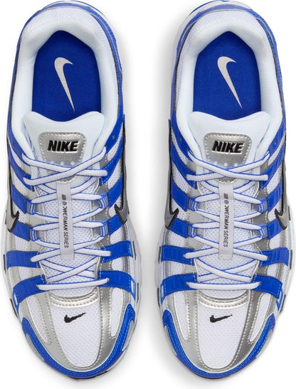 A pair of Nike running shoes in white, blue.