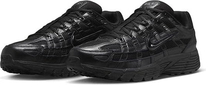 A pair of black Nike sneakers with a textured,