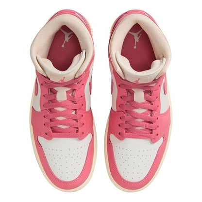 A pair of pink and white high-top sneakers