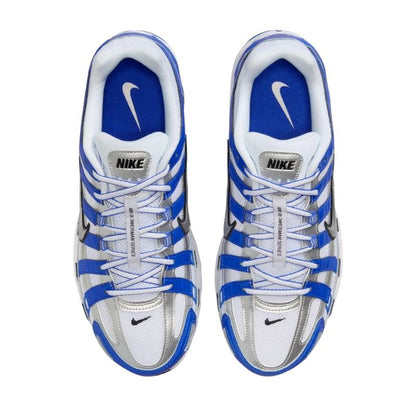 A pair of Nike running shoes in white, blue, and silver, shown from a top-down view on a plain white background.